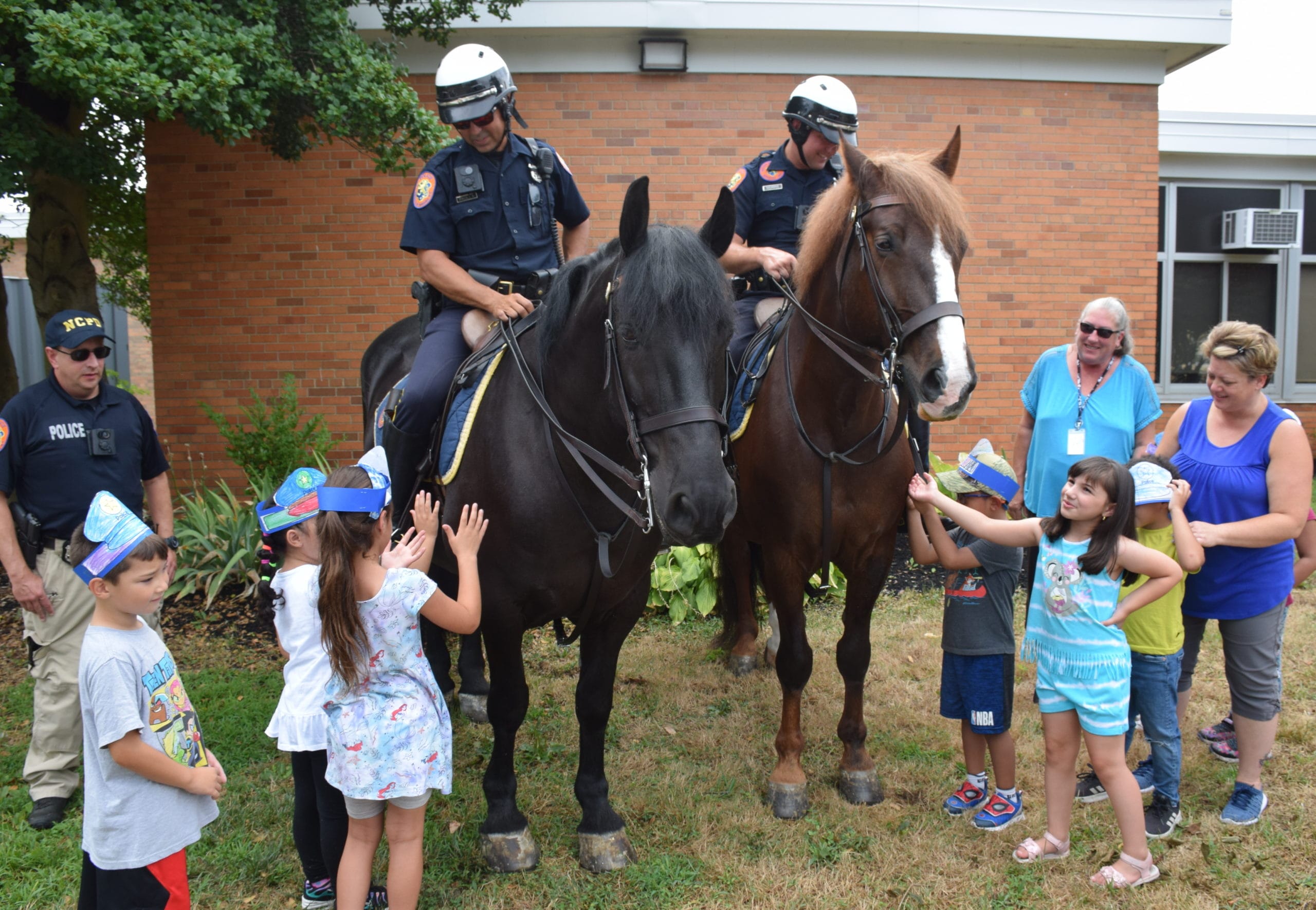 Nassau County Police Department Visits Students At Bowling Green