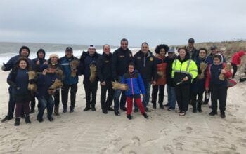 Dozens Of Volunteers Help Strengthen Shoreline By Planting Dune Grass At Tobay