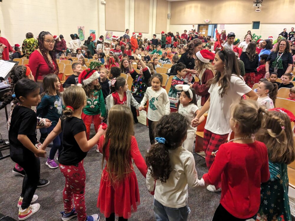Caroling Choir Spreads Cheer Across Islip&#8217;s Schools