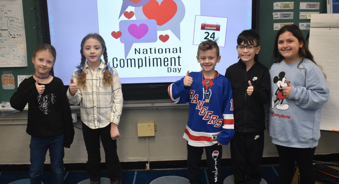In Wantagh, Mandalay Student Hand Out Compliments