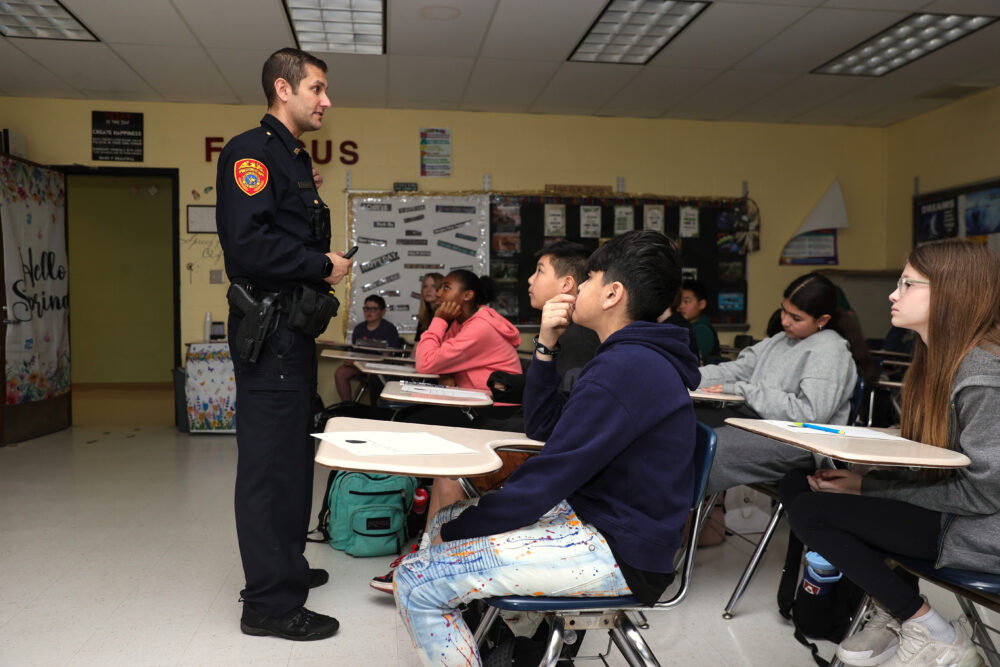 SCPD Officer Offers Safety Tips At Commack Middle School