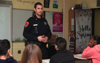 SCPD Officer Offers Safety Tips At Commack Middle School